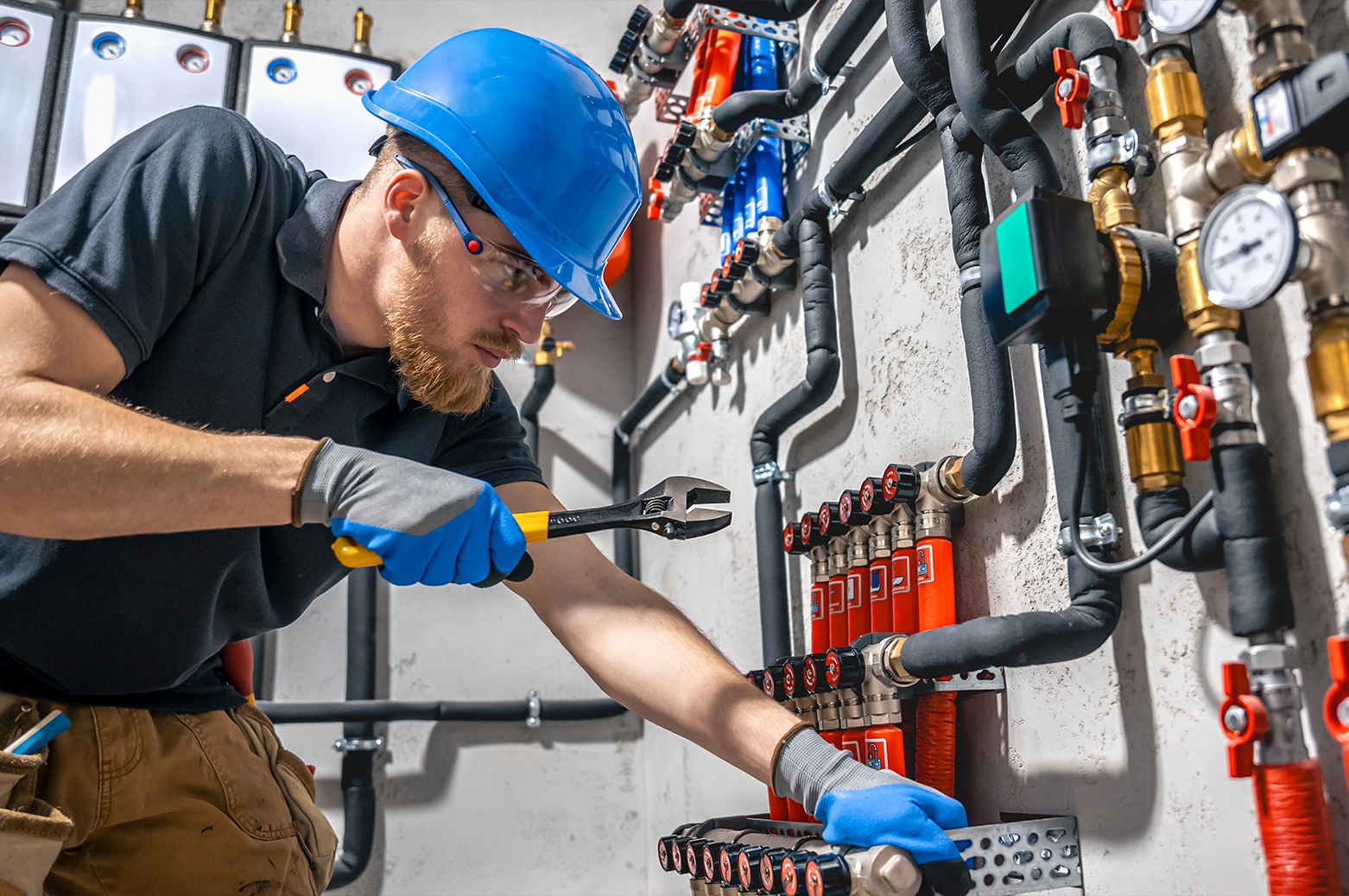 technician-checking-heating-system-boiler-room
